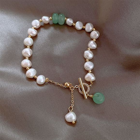 https://genuine-gemstone.com/products/freshwater-crystal-beads-charm-bracelet-bangles-womens-jewelry